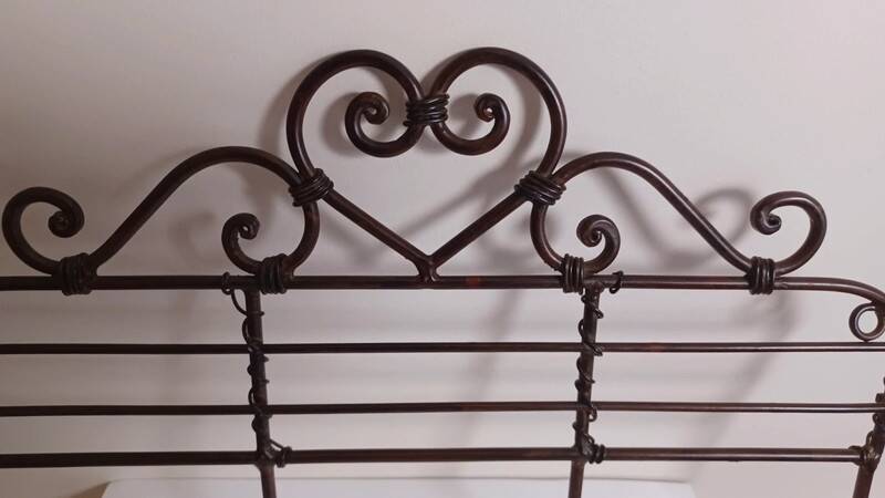 Brown metal wall coat rack