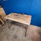 Vintage workbench circa 1930, folding metal leg.
