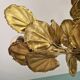 Large brutalist brass chandelier with floral decoration, 1970s.