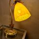 Golden steel lamp, with tulip old marbled yellow glass paste,