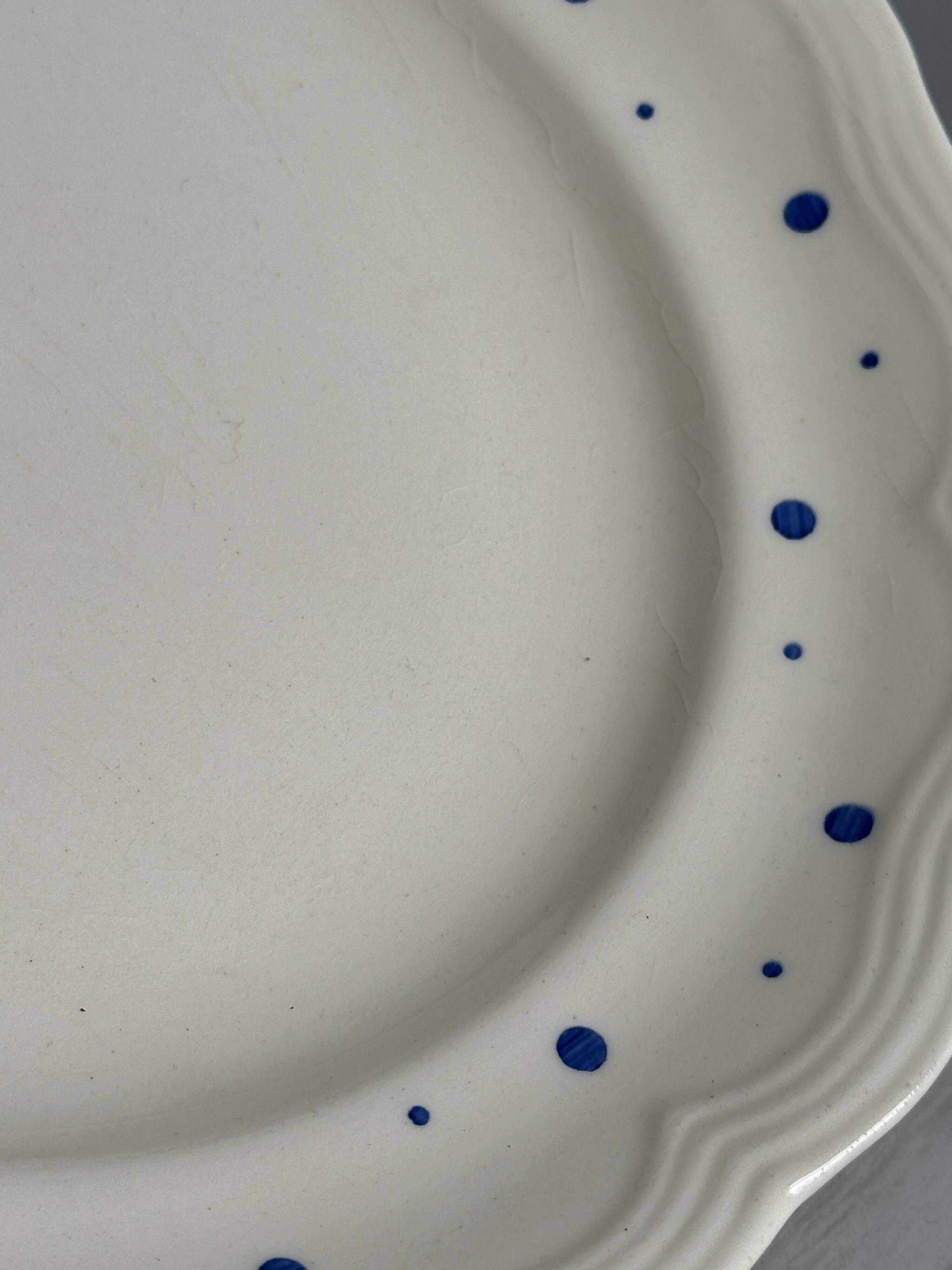 Vintage blue polka dot plate with scalloped edge