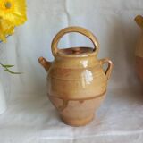 Jug, small terracotta pitcher with yellow glaze
