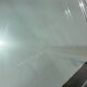 Oval designer coffee table in tempered glass