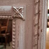 Louis XVI style trumeau mirror in patinated wood