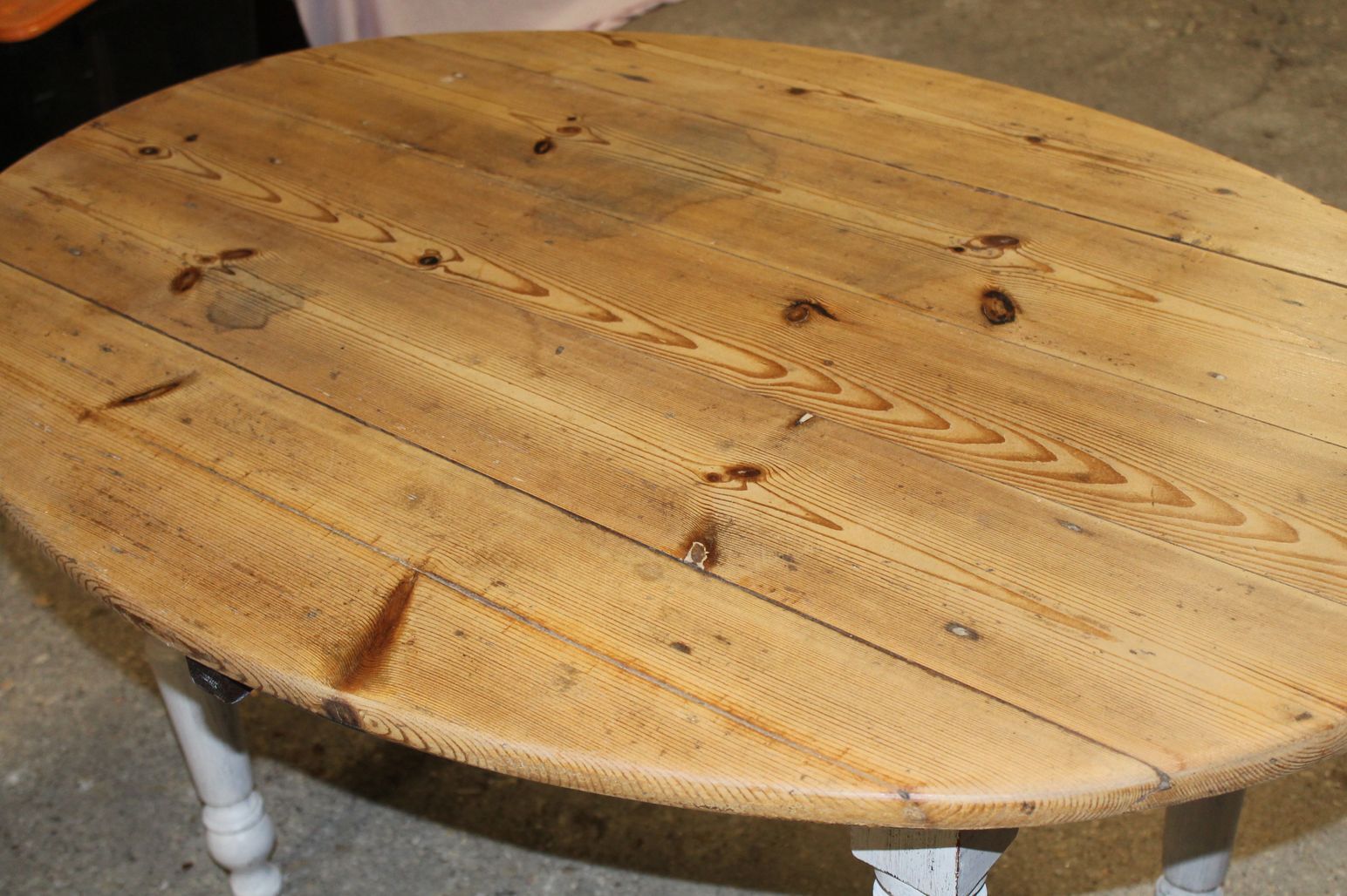 Oval table with flaps