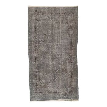 Vintage handmade turkish accent rug over-dyed in gray color