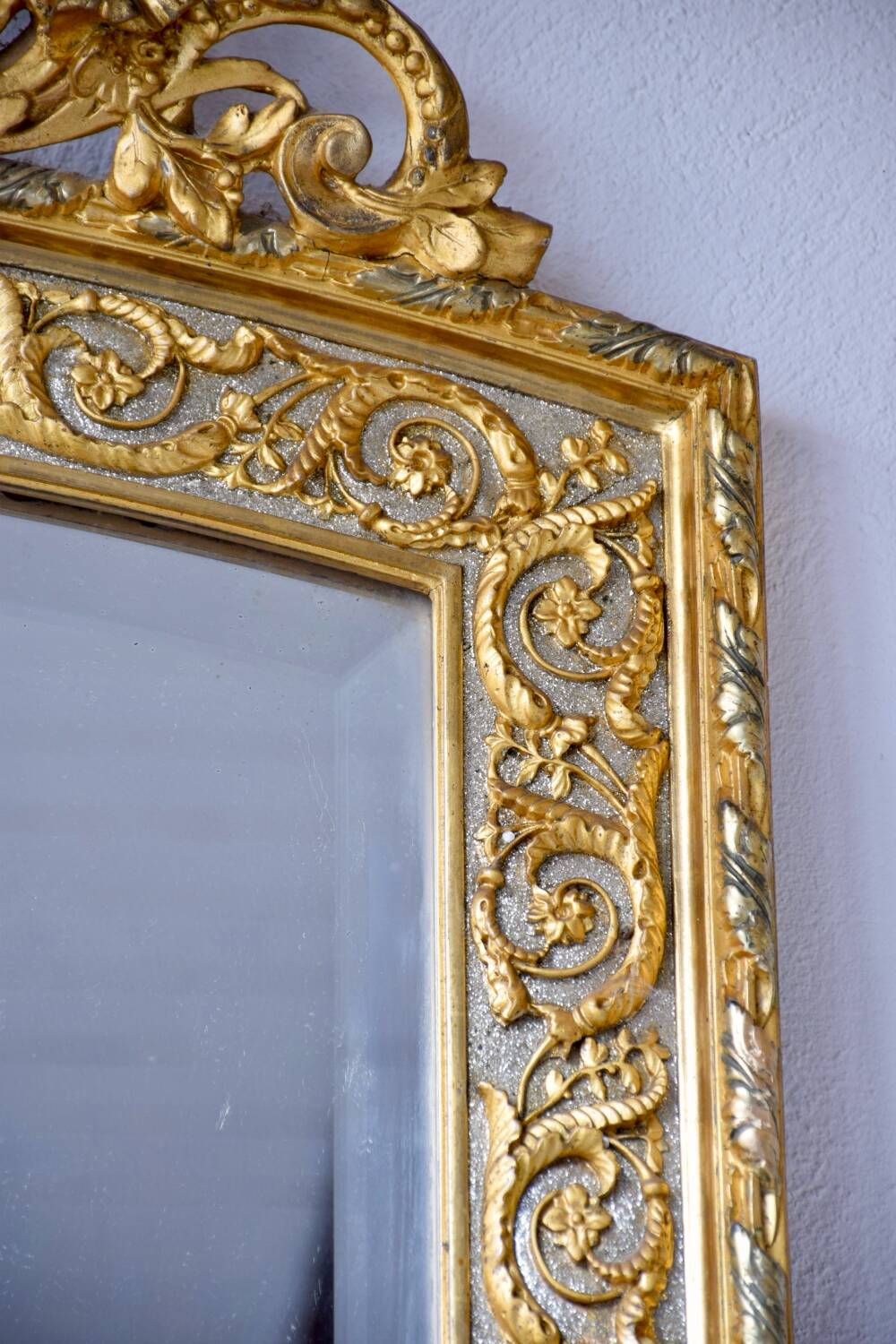 Large antique gilded mirror in the Baroque style