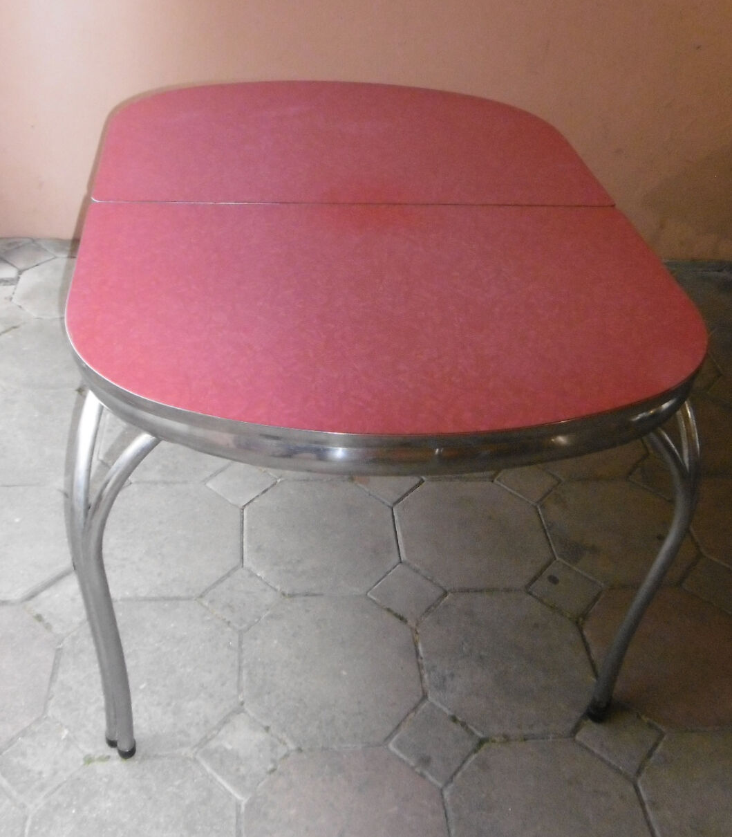 Vintage table of the 60s in red formica and chrome legs