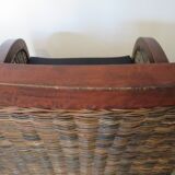 2 colonial-style armchairs in woven rattan and exotic wood