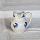 Pichet antique terre d'acier Saint-Uze motif fleuri bleu cobalt
