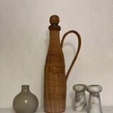 Grande bouteille en verre et osier