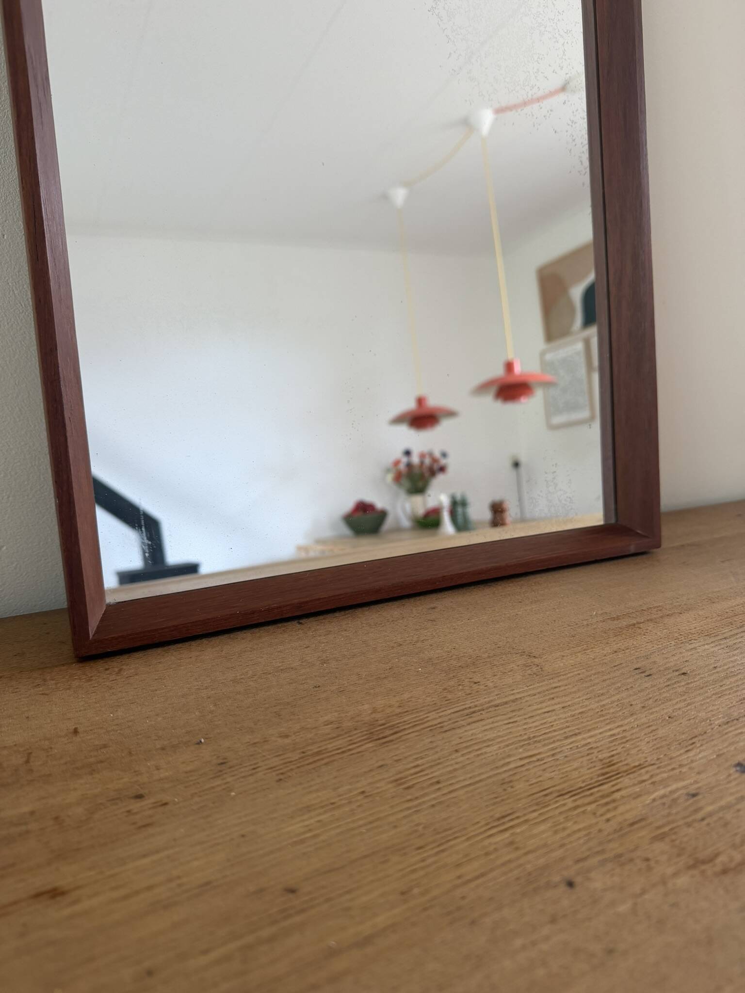 Beautiful vintage Danish teak mirror with mittered edges and nice brass det