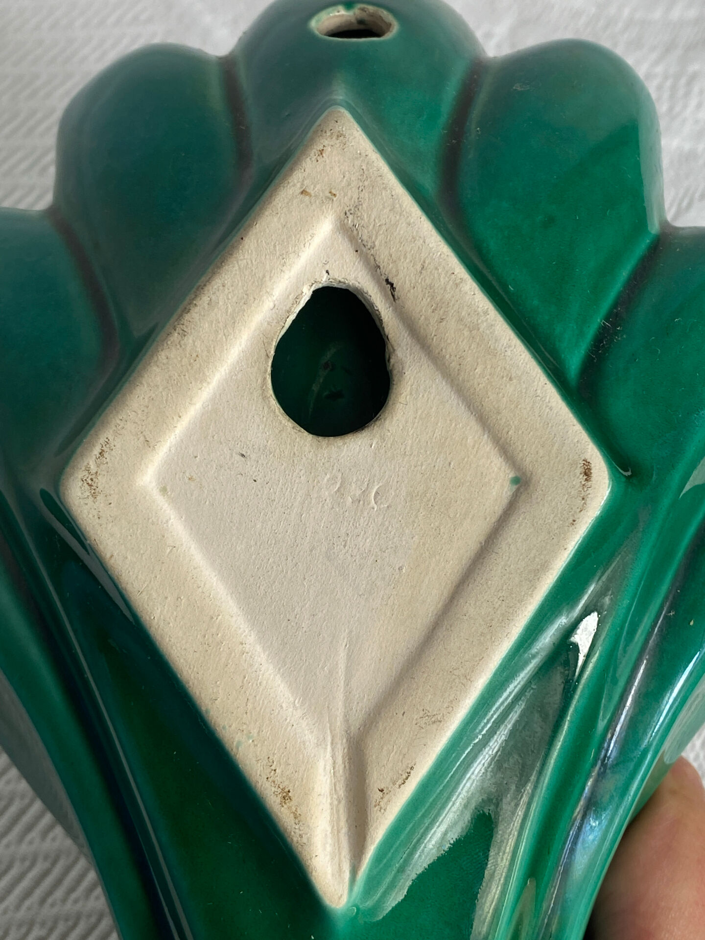 Ceramic shell wall light