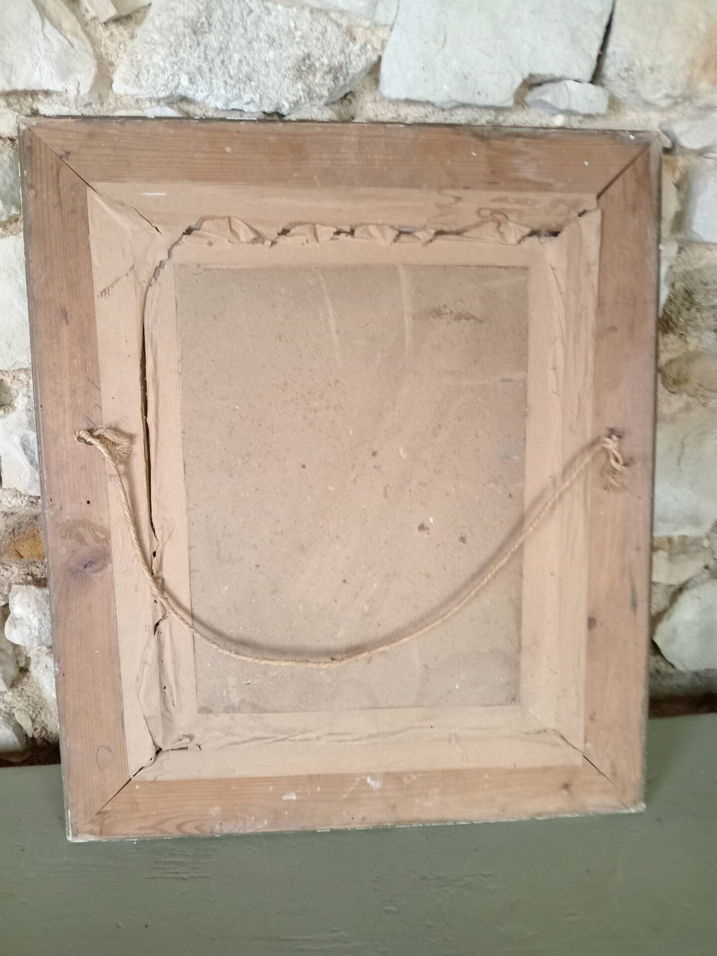 Antique mirror in stucco and wood