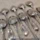 10 silver-plated metal coffee spoons, PG style, Art Nouveau flowers.