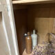 Small one-door Art Deco cabinet with a patina.