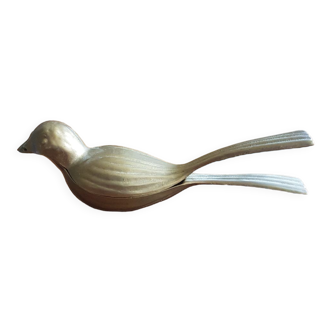 Brass hazelnut nutcracker in the shape of a bird