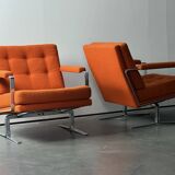 Pair of Karl Erik Ekselius armchair, in orange and chrome Kadrat fabric