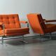 Pair of Karl Erik Ekselius armchair, in orange and chrome Kadrat fabric