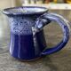 Small enamelled earthenware milk jug