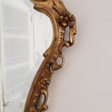 Beveled mirror and gilded wood