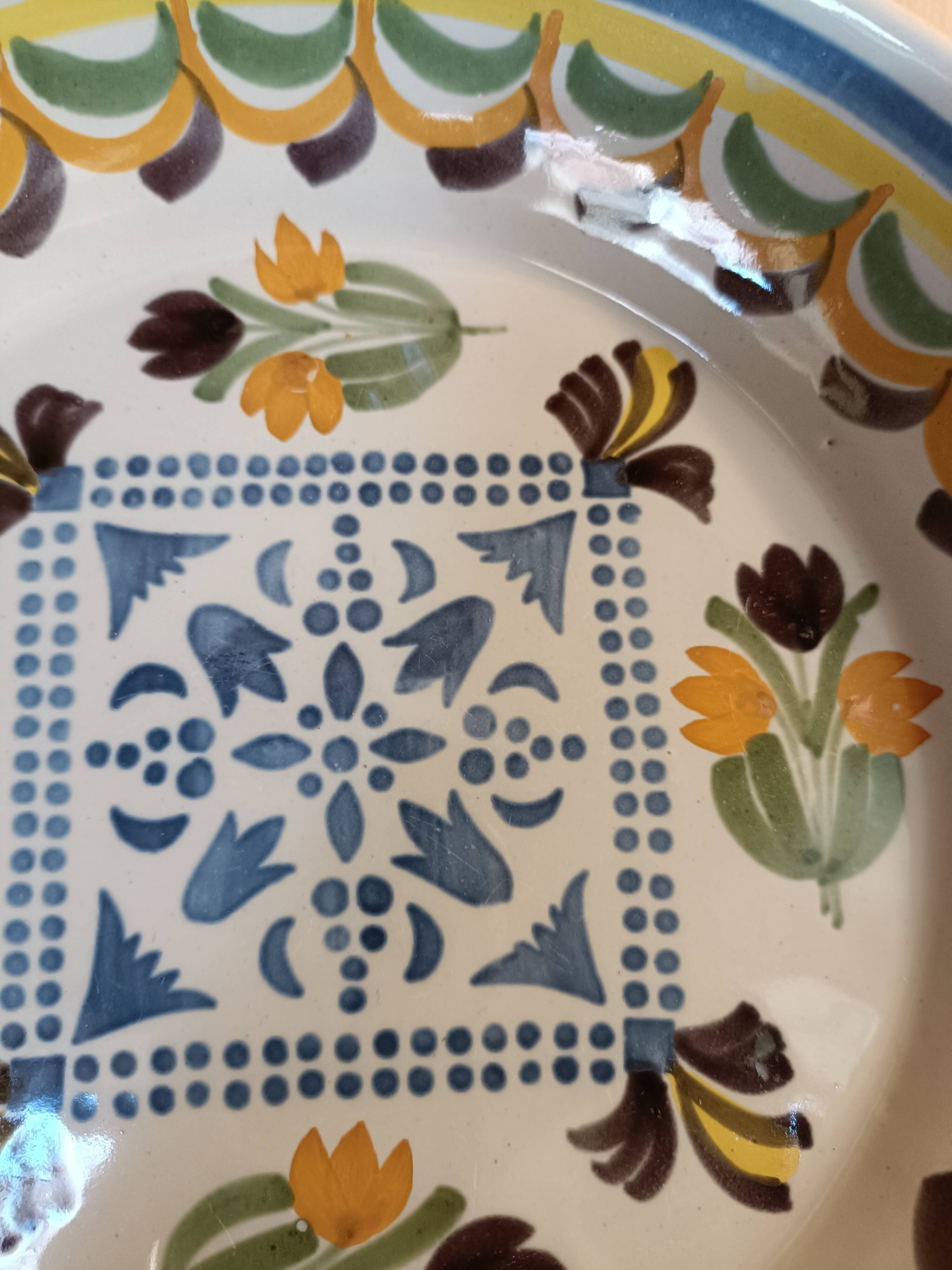 Antique calotte plate in Nevers faience.