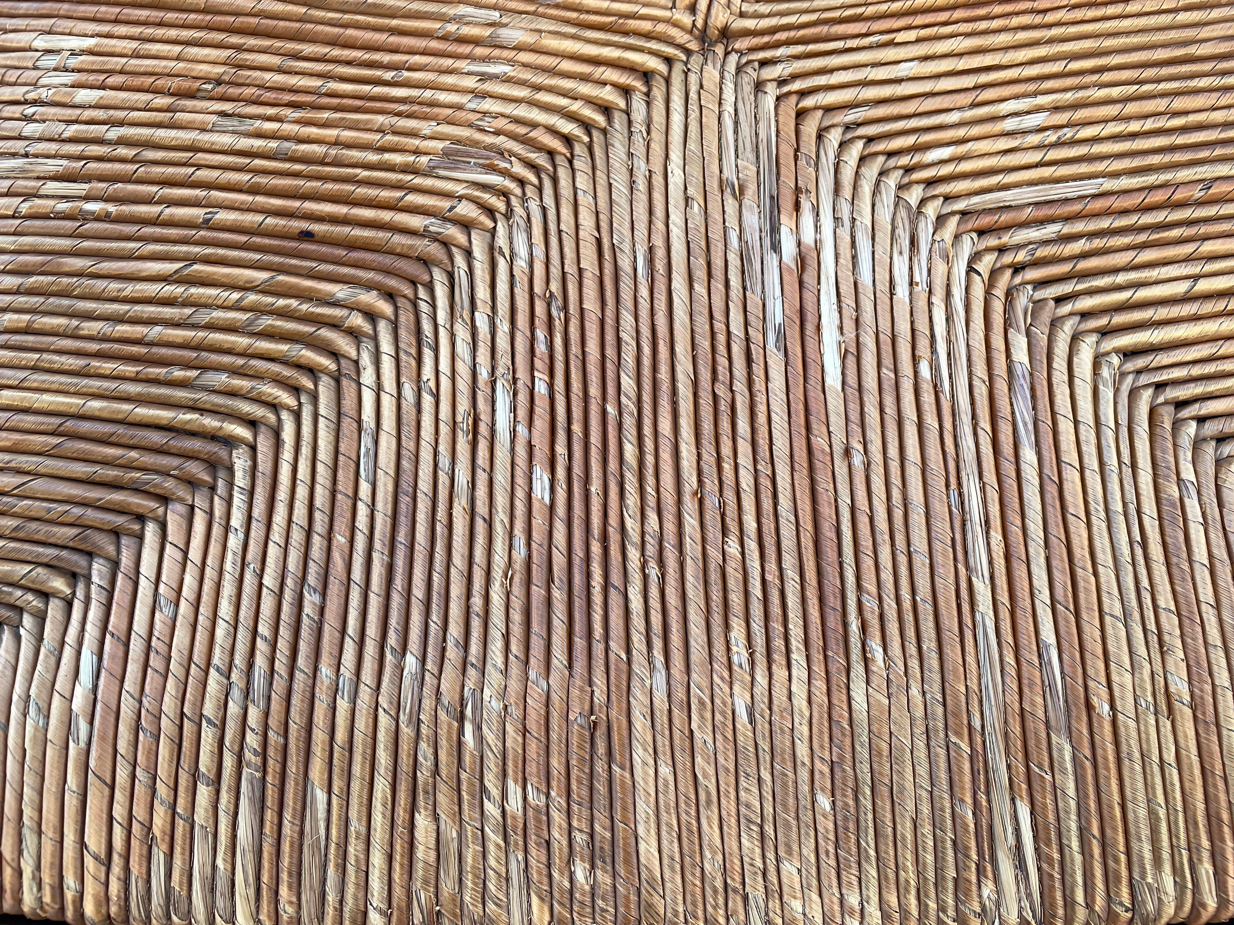 Vintage armchair in straw and brutalist wood