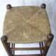 Ancient wooden and straw stool