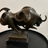 Bronze bull on marble base signed Milo