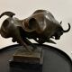 Bronze bull on marble base signed Milo