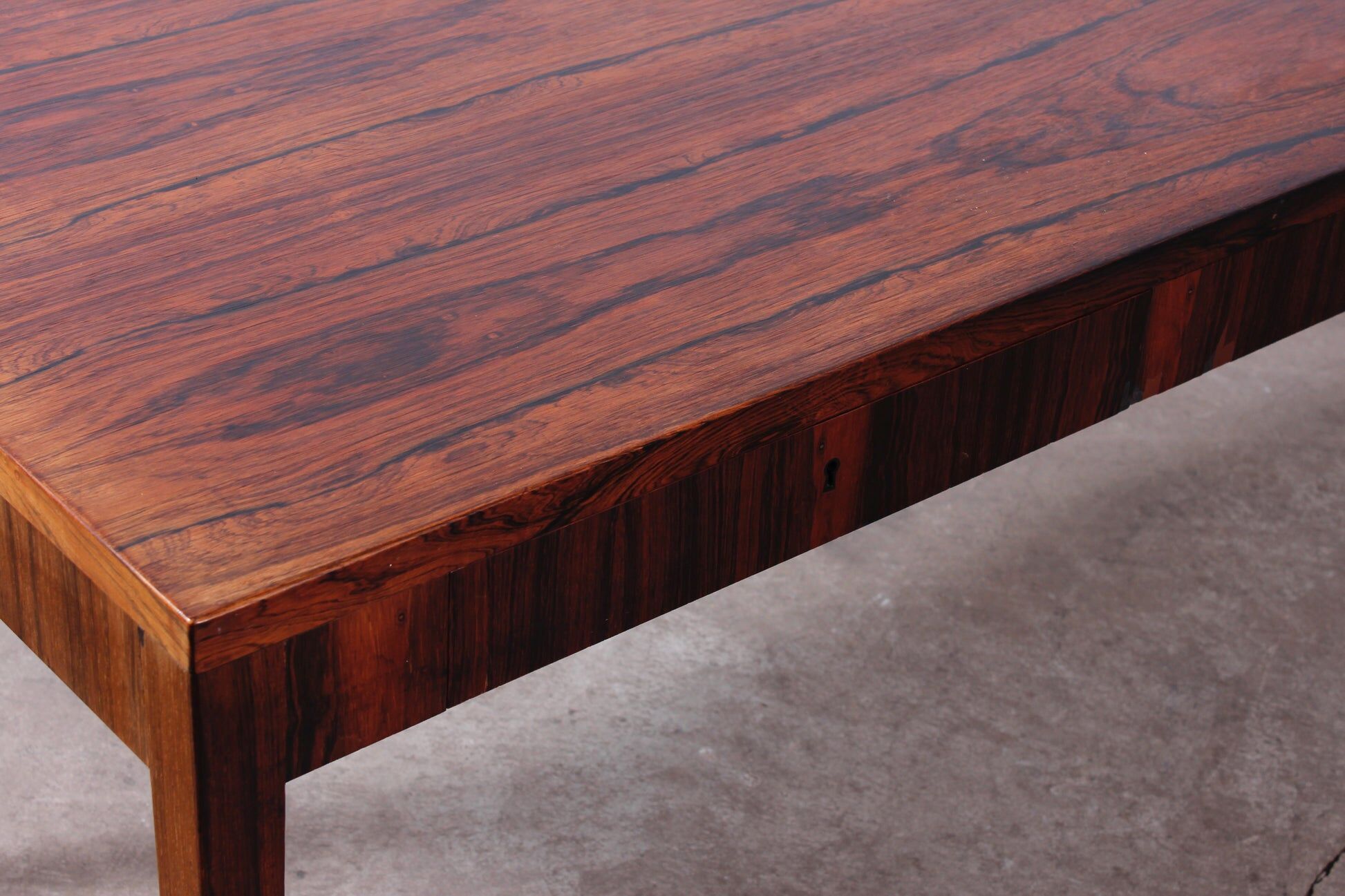 Minimalist rosewood desk by Riis Andersen