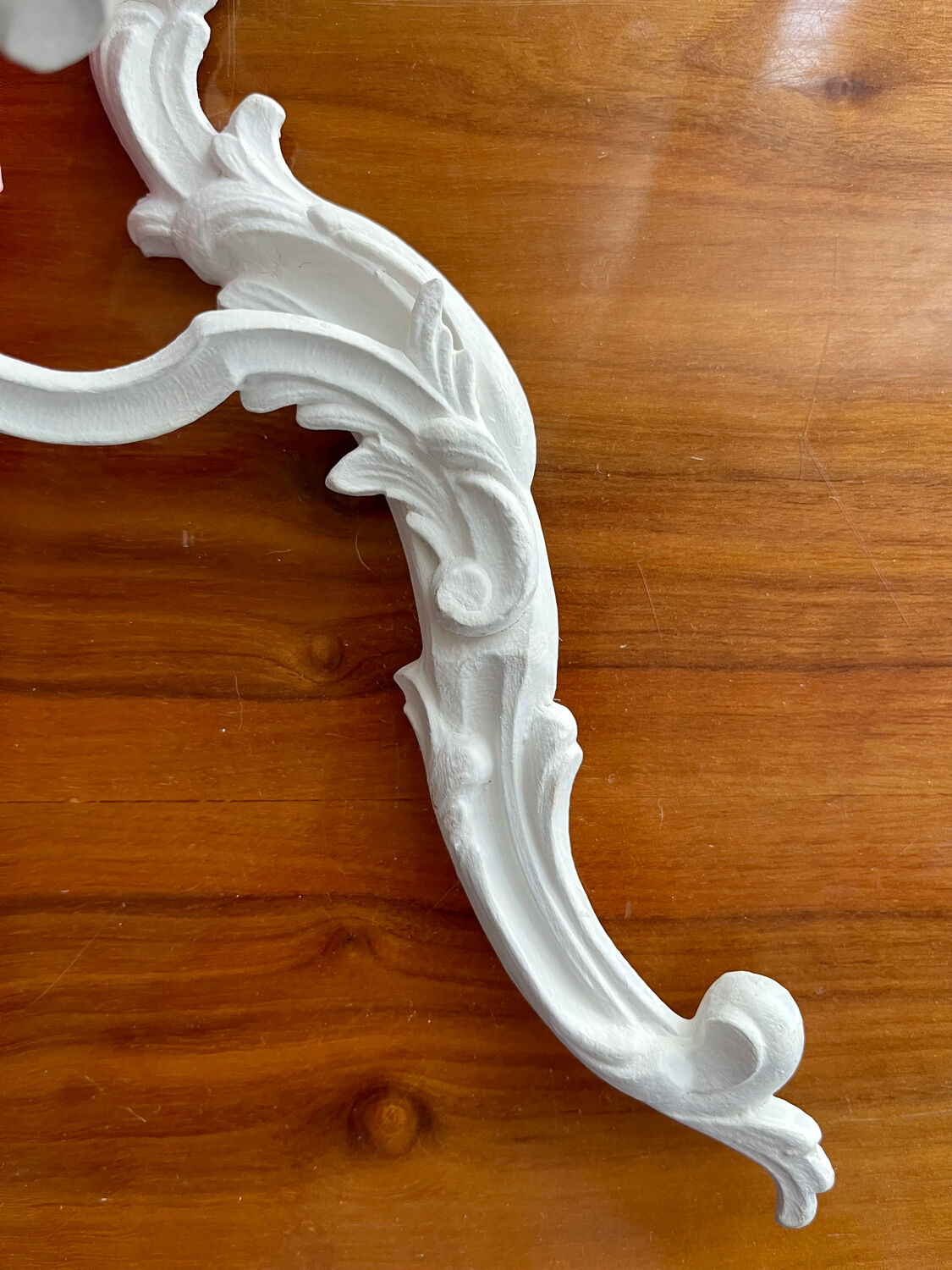 Louis XVI style bronze wall light with white patina