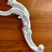Louis XVI style bronze wall light with white patina