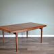 Extending teak table