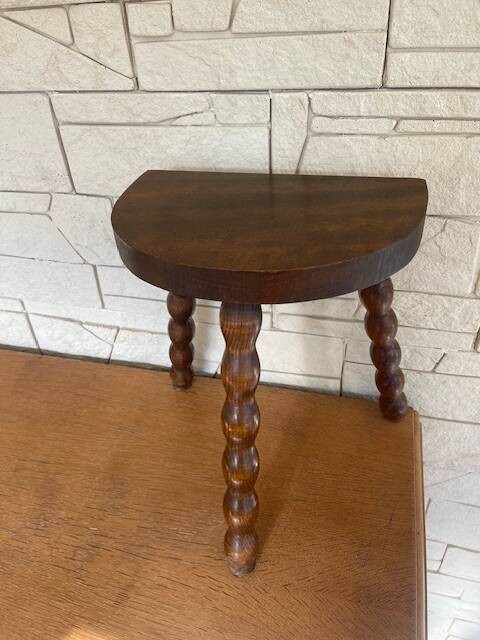 Low tripod stool with turned legs