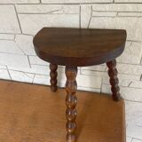 Low tripod stool with turned legs