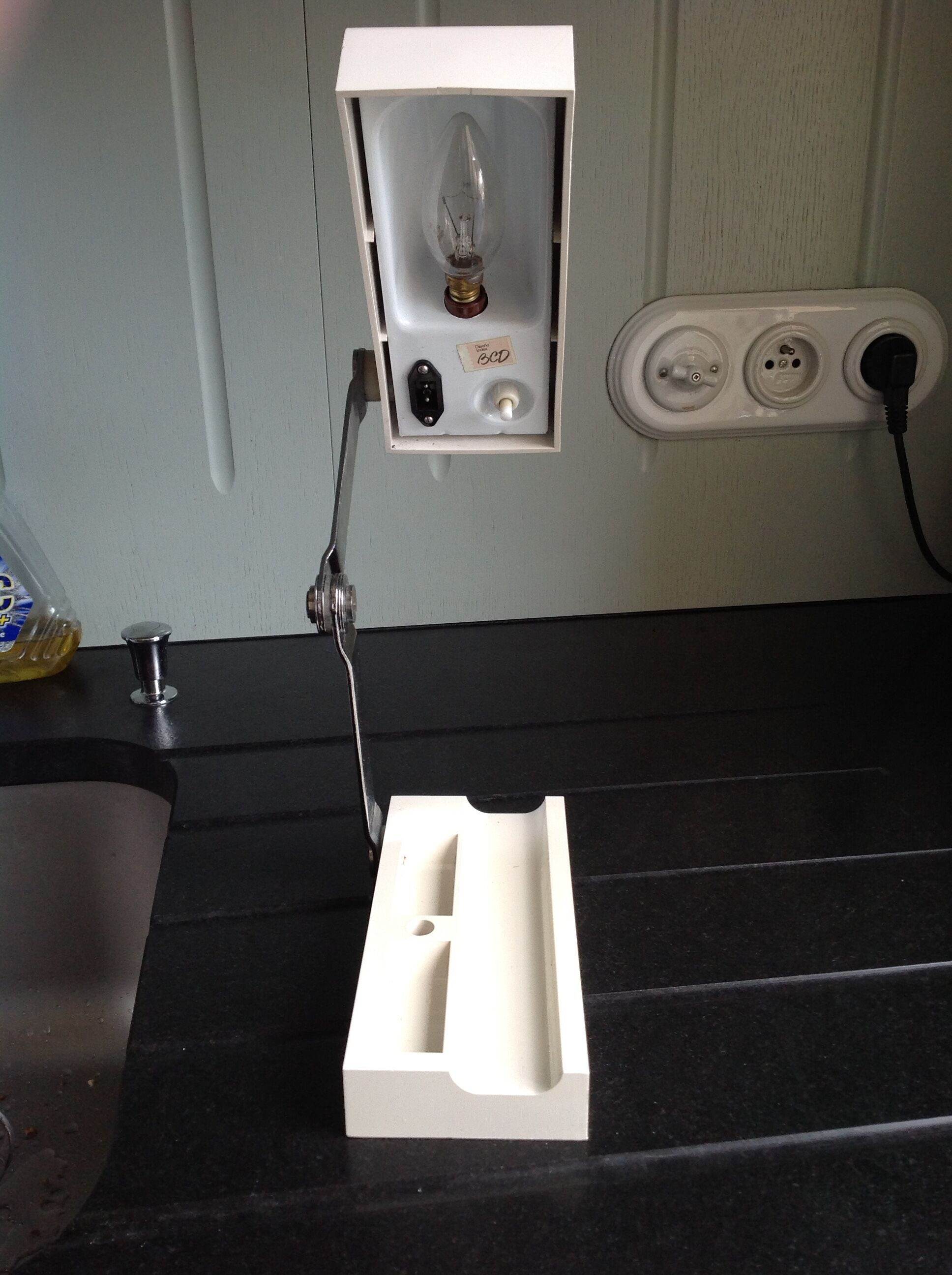 Vintage travel lamp adjustable and folding, 70s; folded it becomes a box.