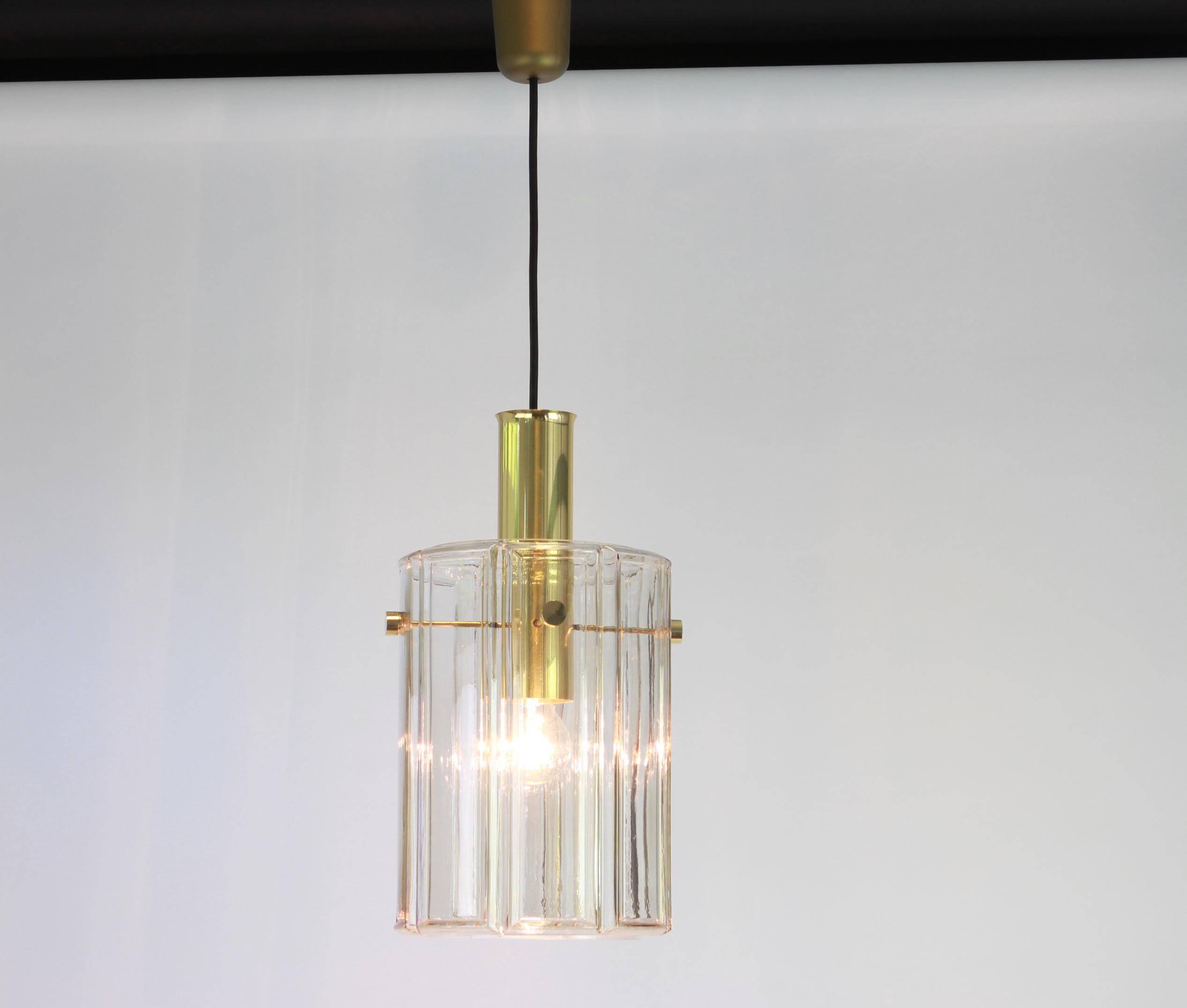 Large hanging lantern-shaped lamp with a cylindrical glass shade by Limburg, Germany, 1960s.