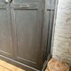 Old wooden locker with black patina