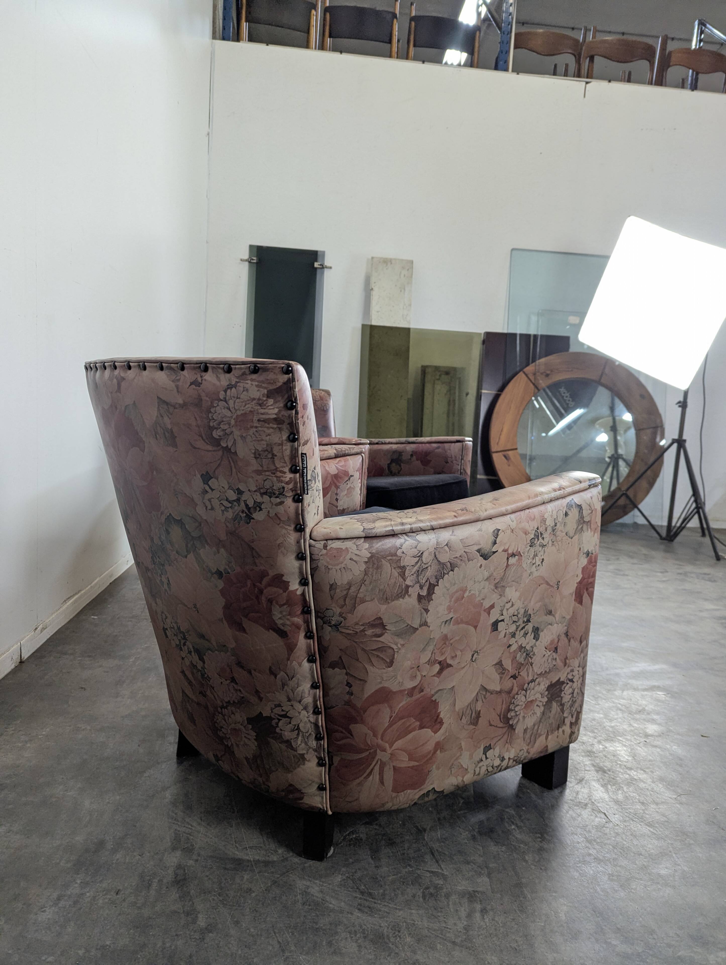 Pair of Roche Bobois armchairs with floral patterns.
