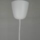 UFO-shaped pendant lamp with white glass on top and clear glass with white