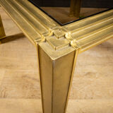 Table basse en laiton et verre.