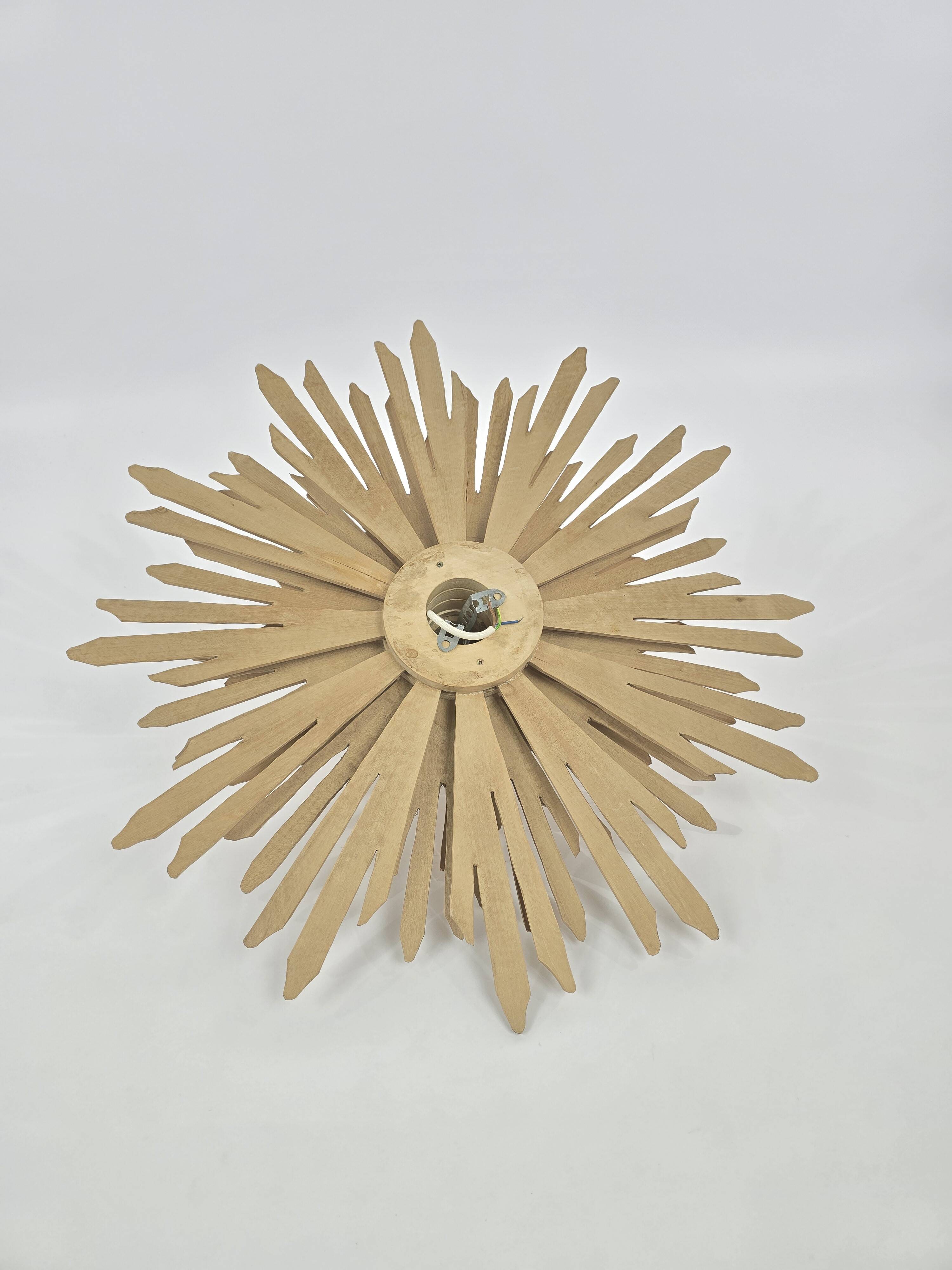 Giant sunburst wall lamp