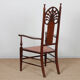 English armchair attributed to J.S. Henry, late 19th century.