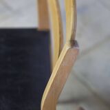 Pair of Scandinavian chairs in teak and faux leather, 1960.