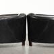 Set of two black vintage cowhide aviator design armchairs