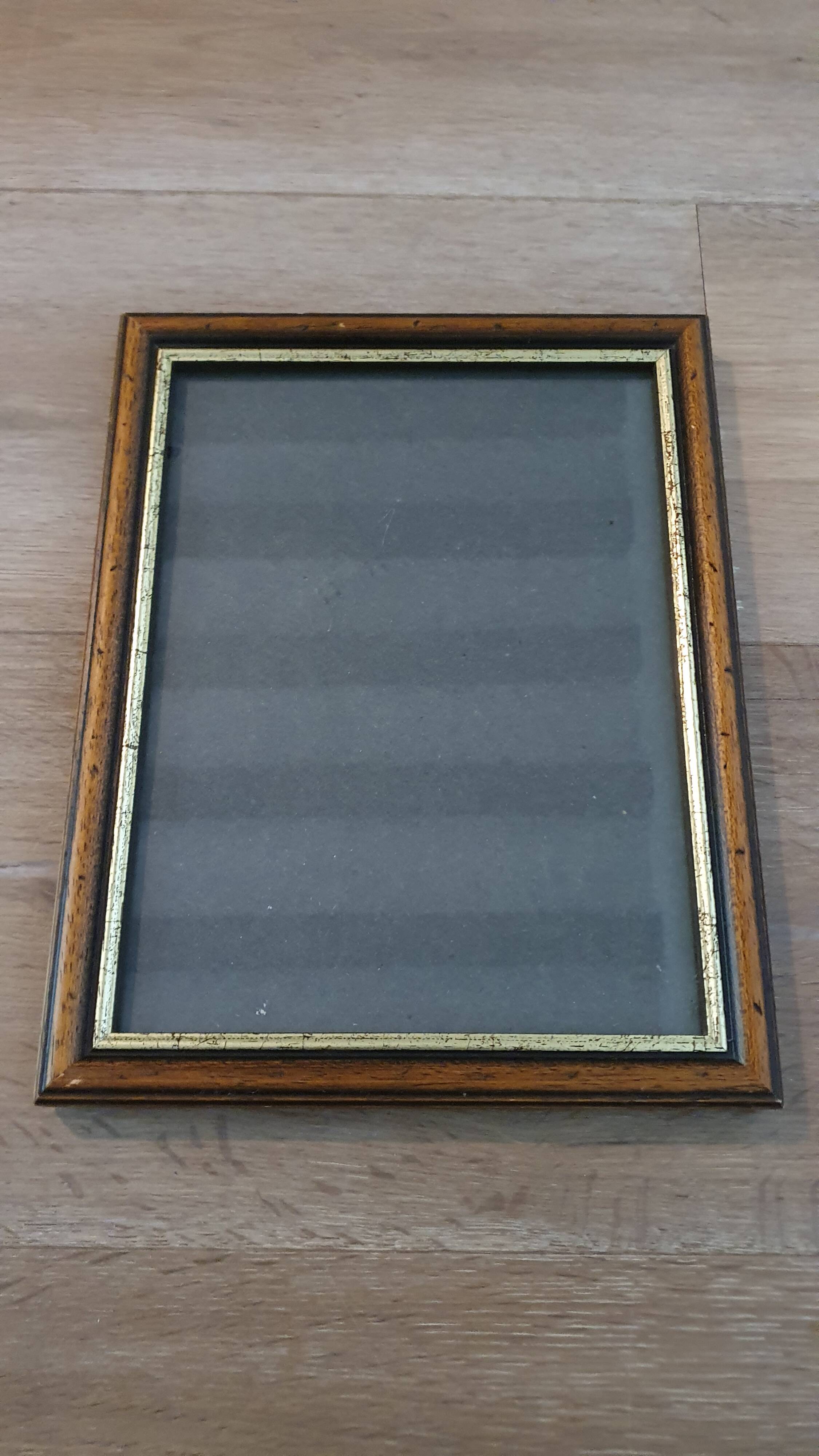 Set of 2 wooden frames with gilded edging