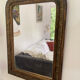 Louis-Philippe mirror, wood and gilded stucco — late 19th century