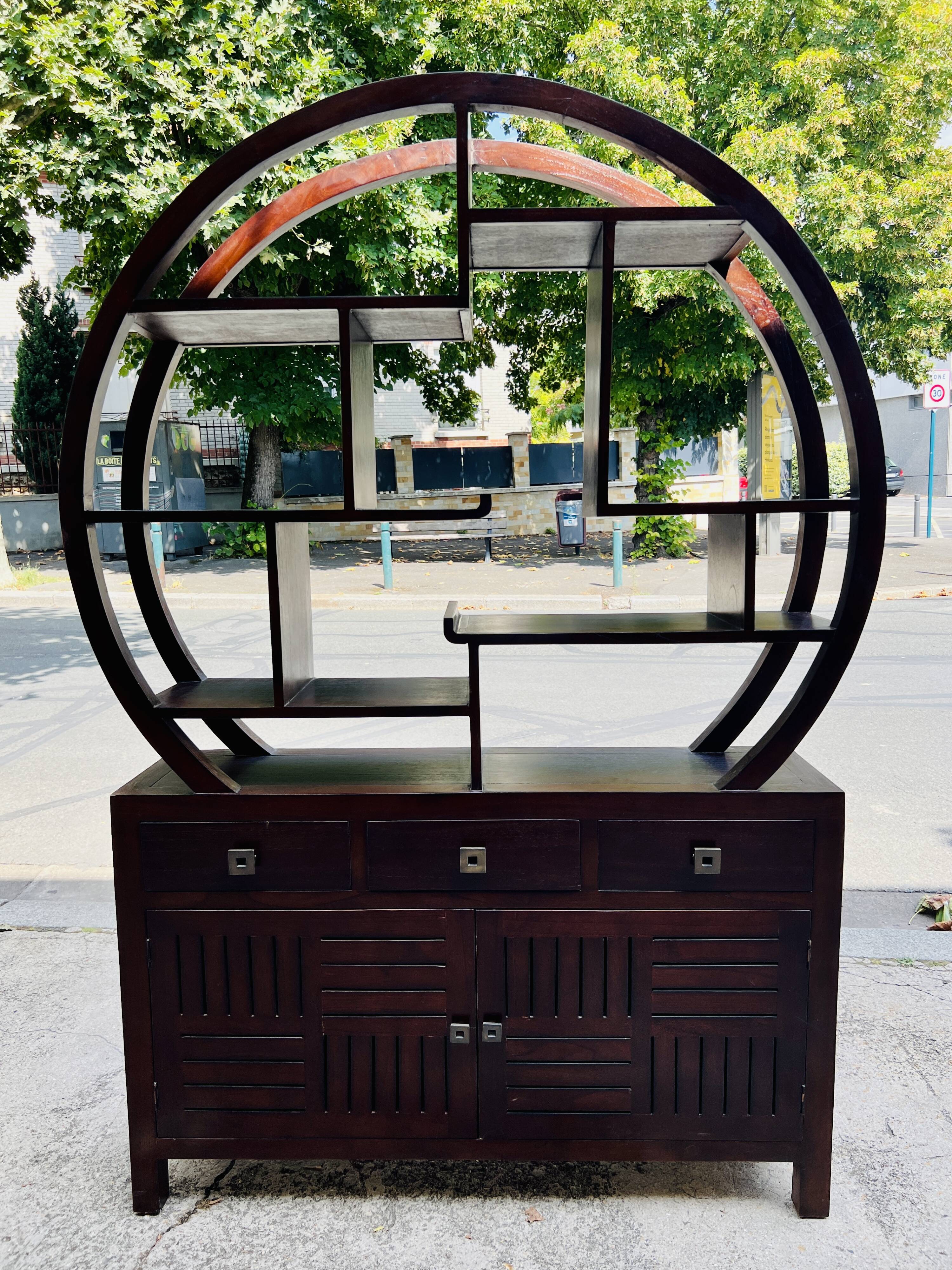 Round galay shelf on bahut sideboard