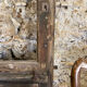 Old glazed wooden door patinated